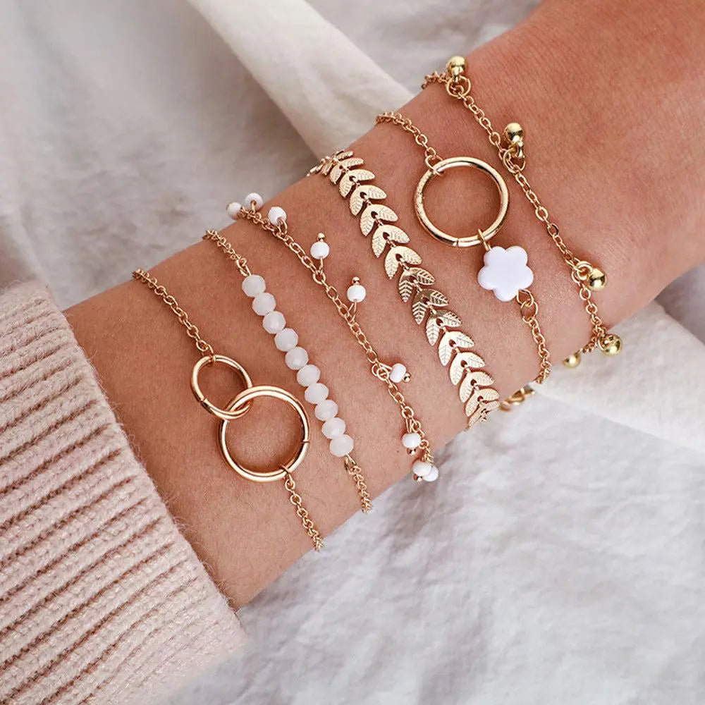 Pack med Boho-armband i guld