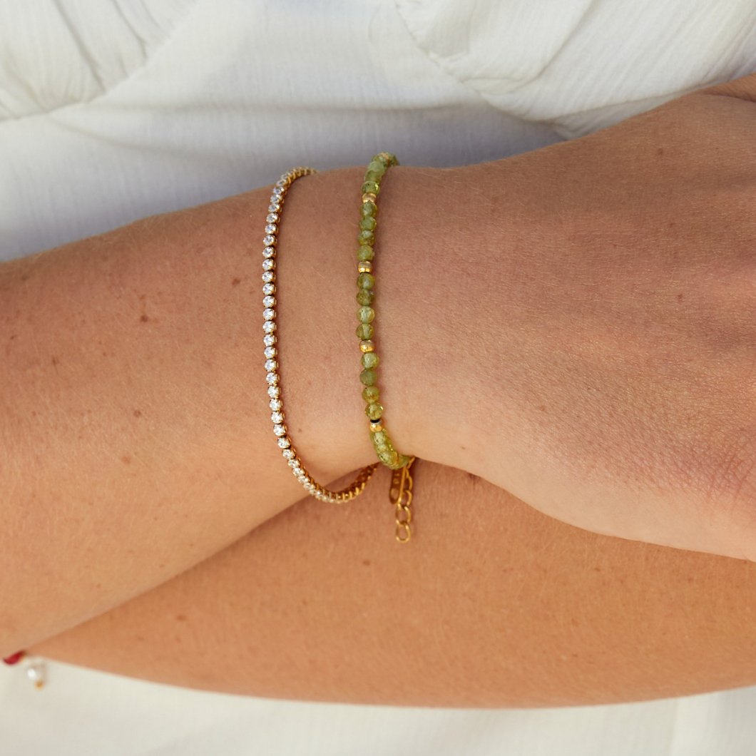 Guld tennisarmband