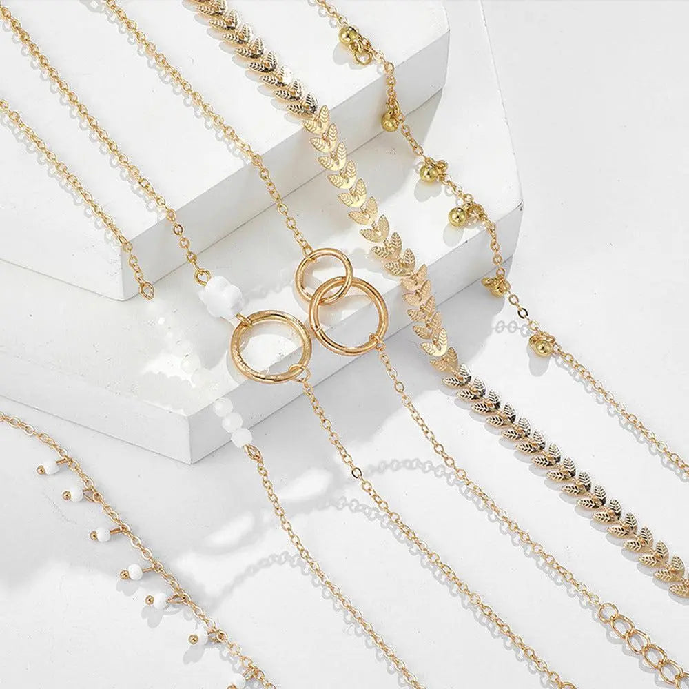 Pack med Boho-armband i guld