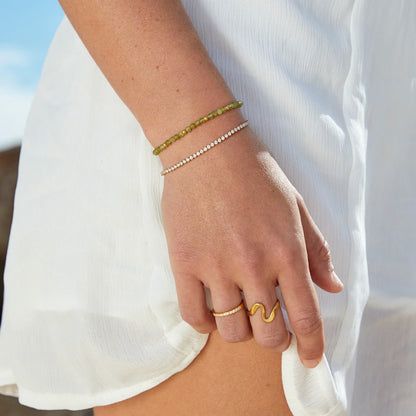 Guld tennisarmband