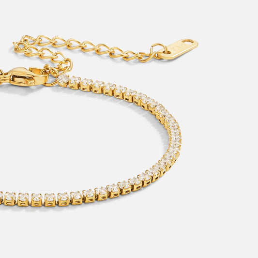Guld tennisarmband