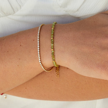 Guld tennisarmband