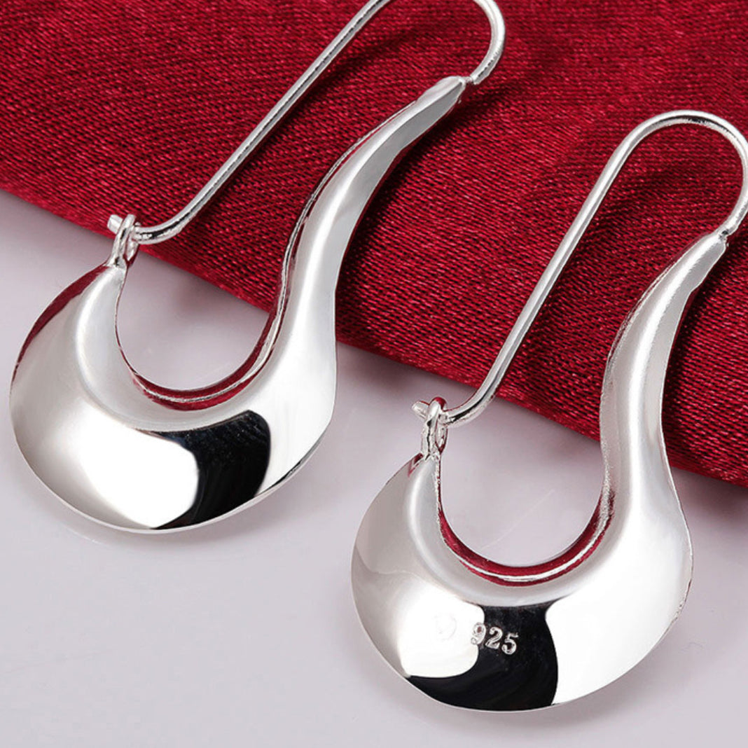 Modernistiska silverörhängen för kvinnor